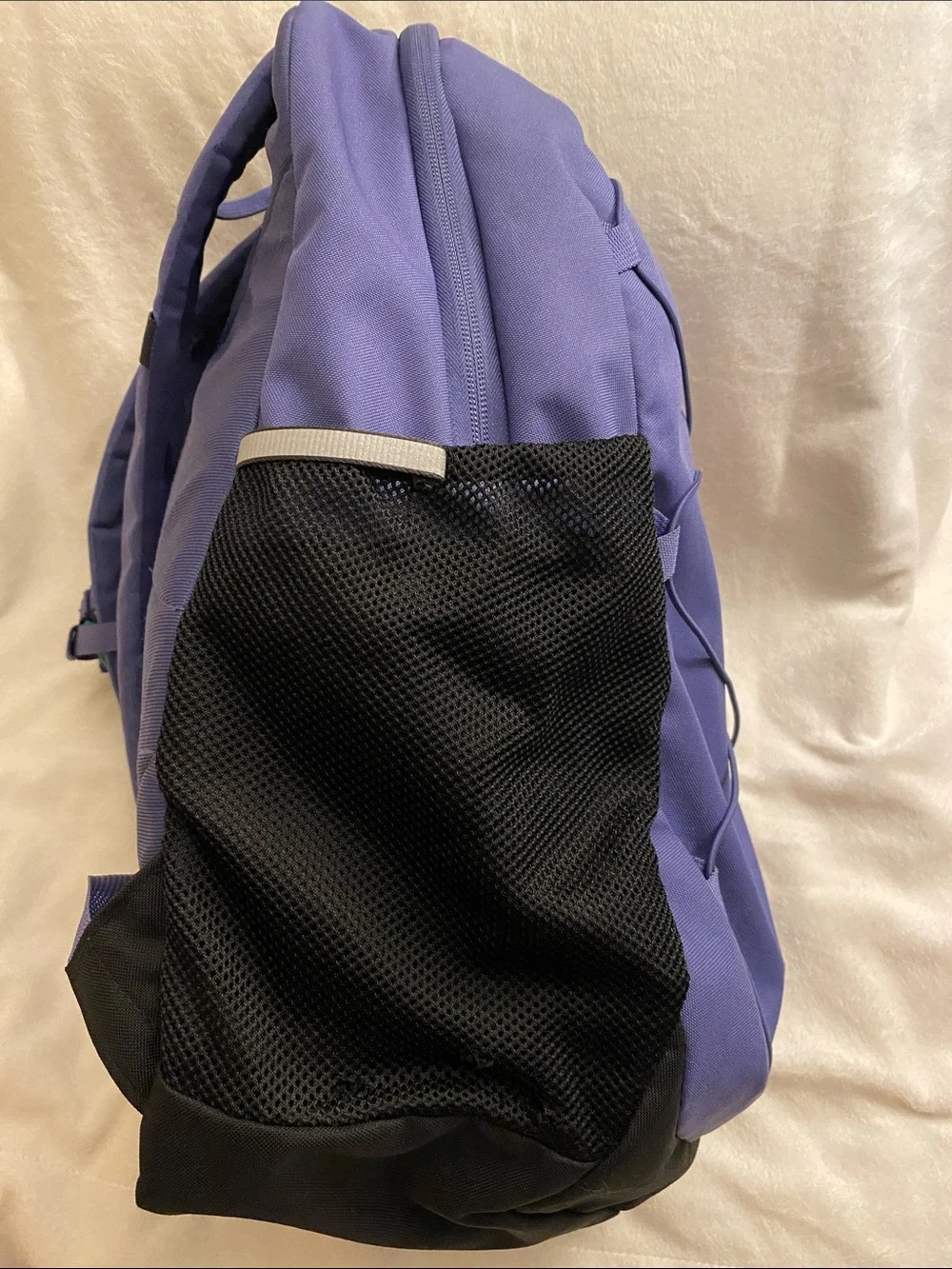 The North Face youth court Jester Backpack purple and black
